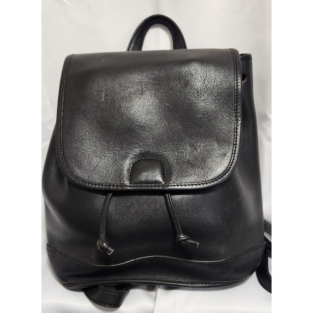 M LONDON, BACKPACK BLACK LEATHER BACKPACK PURSE. HOLE IN REAR ZIP‎ POCKET